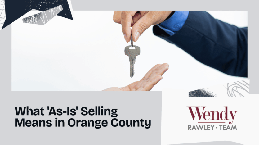 Hand giving a house key to another person, symbolizing an as-is home sale in Orange County, California.